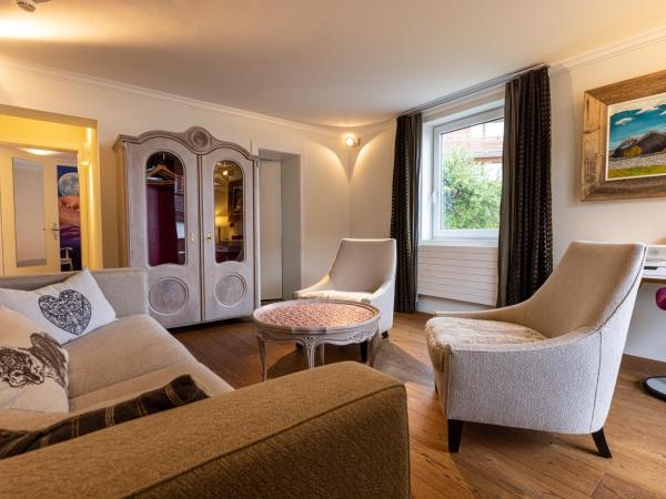 Home Hotel Arosa : photo 2 de la chambre suite