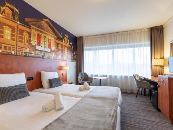 New West Inn Amsterdam : photo 2 de la chambre chambre lits jumeaux confort