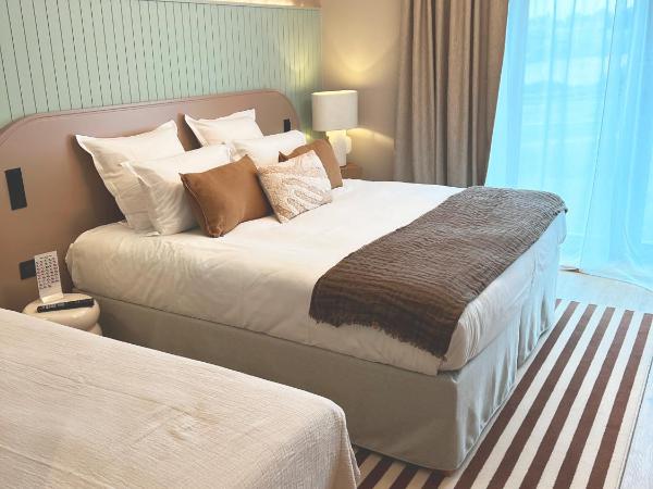 Emeria Dinard Thalasso Spa : photo 3 de la chambre chambre familiale - vue latérale sur mer