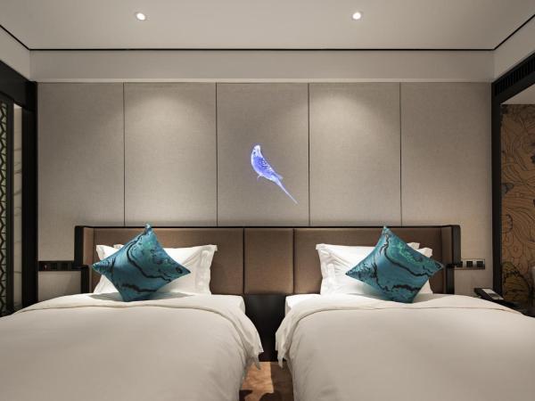 Paco Hotel GuangZhou Zoo Metro Branch-Free Shuttle Bus for Canton Fair : photo 7 de la chambre chambre lits jumeaux deluxe