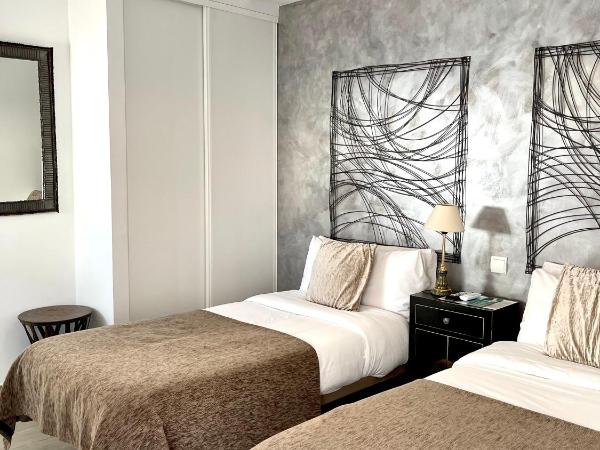 Hostal El Caprichito Marbella : photo 3 de la chambre chambre lits jumeaux