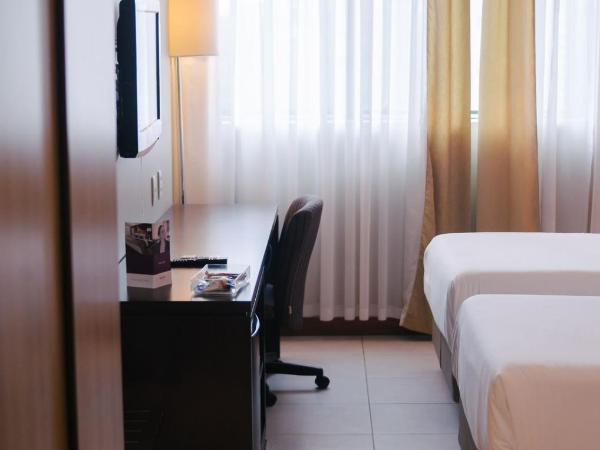 Mercure Salvador Pituba : photo 1 de la chambre chambre lits jumeaux supérieure avec balcon