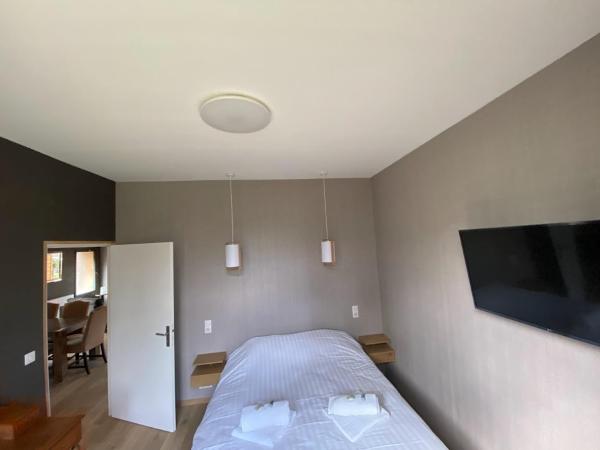 Parc Beausejour Aparthotel : photo 3 de la chambre chambre familiale - vue sur jardin