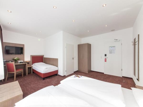 Hotel Excelsior Dortmund Hauptbahnhof : photo 1 de la chambre chambre triple standard