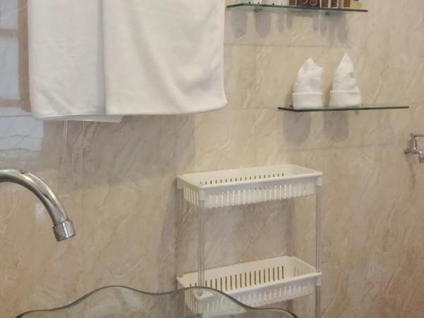 Naturbliss Resort Village : photo 1 de la chambre chambre triple supérieure