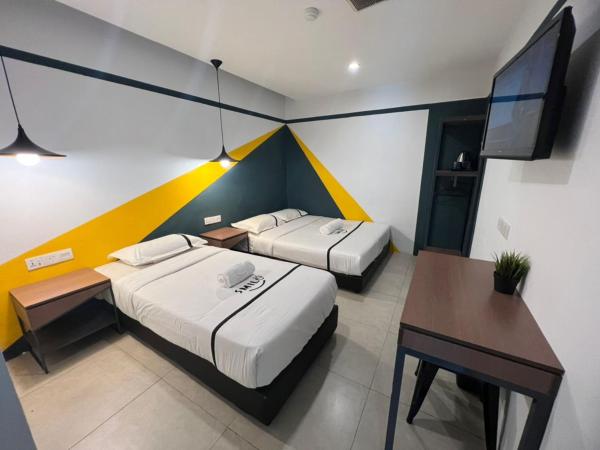 Smile Hotel Cheras Sri Permaisuri : photo 1 de la chambre chambre triple