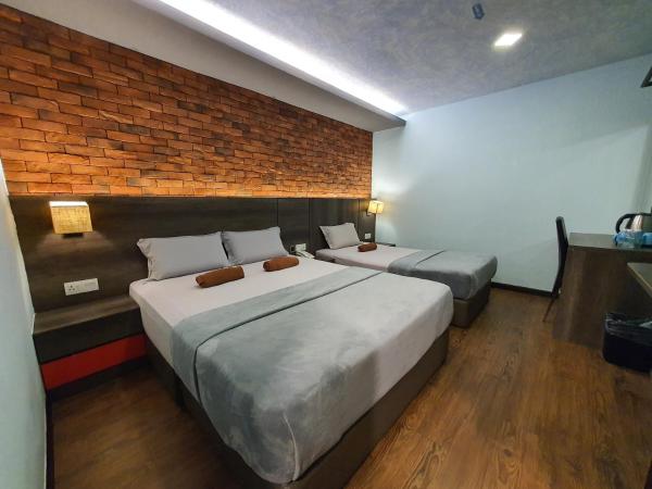 Cute Hotel & Dorms Ipoh : photo 2 de la chambre chambre triple