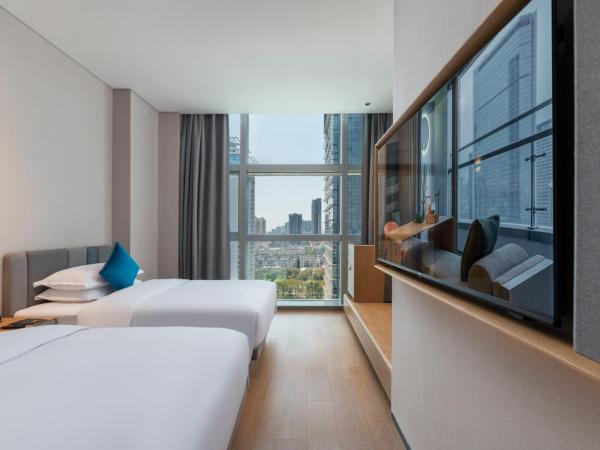 Pagoda Hotel Shenzhen : photo 2 de la chambre chambre lits jumeaux deluxe