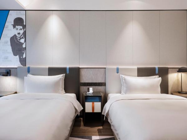 Qingdao Oriental Studio Chuangzhi SSAW Hotel : photo 4 de la chambre chambre affaires lits jumeaux