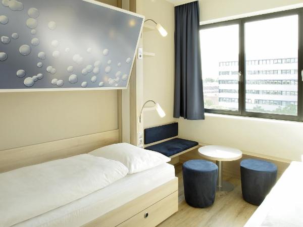 H2 Hotel Berlin-Alexanderplatz : photo 10 de la chambre chambre quadruple