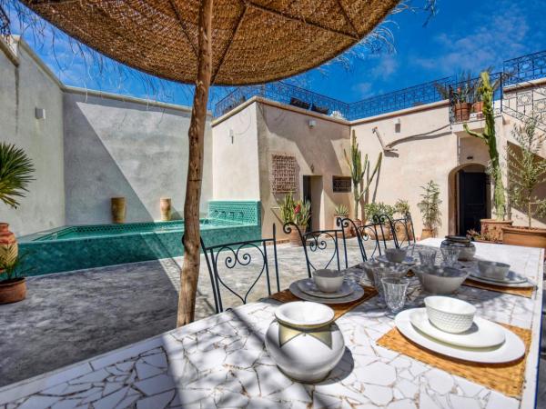 Riad Amazine - Piscine - Rooftop - 6 or 7 Px : photo 1 de la chambre suite supérieure - vue sur mer