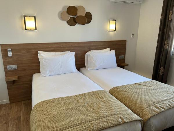 Hôtel Le Mirage : photo 5 de la chambre chambre lits jumeaux