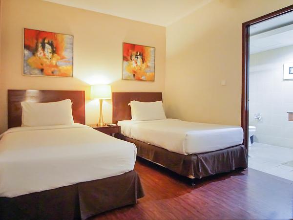 Grand Dafam Ancol Jakarta : photo 1 de la chambre deluxe suite twin bed