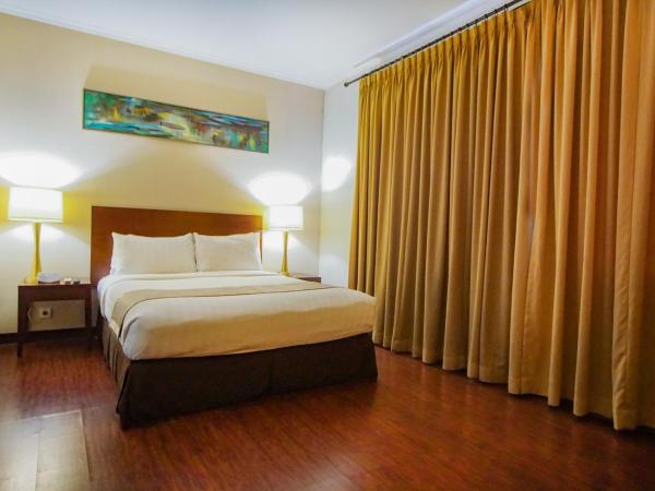 Grand Dafam Ancol Jakarta : photo 1 de la chambre deluxe suite queen bed