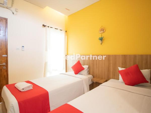Griya Damai Syariah Yogyakarta Mitra RedDoorz : photo 4 de la chambre chambre lits jumeaux