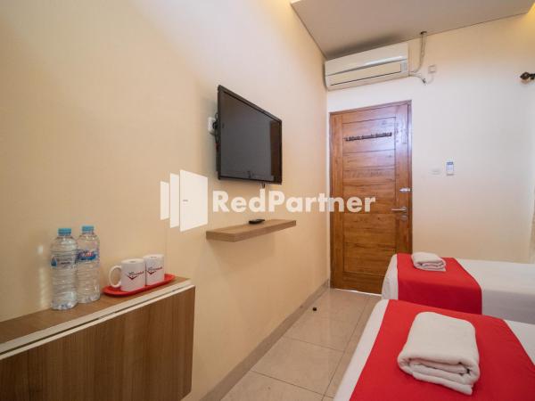 Griya Damai Syariah Yogyakarta Mitra RedDoorz : photo 5 de la chambre chambre lits jumeaux