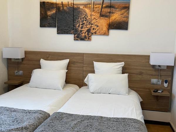 Hôtel Le Mirage : photo 2 de la chambre chambre lits jumeaux