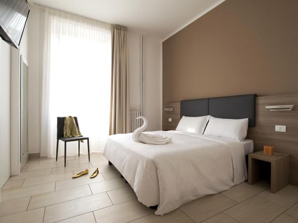 Oasi Village Hotel : photo 3 de la chambre chambre double ou lits jumeaux