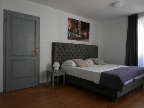 Tri Lava Luxury Living : photo 2 de la chambre chambre double ou lits jumeaux avec terrasse