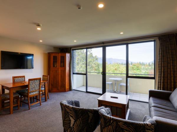 Garden Court Suites & Apartments : photo 3 de la chambre appartement 1 chambre avec balcon