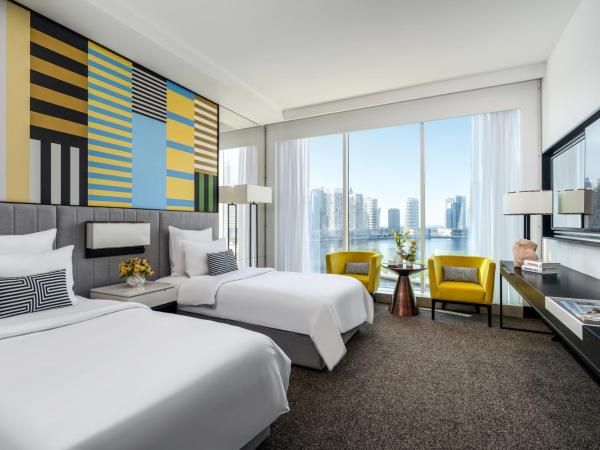Pullman Dubai Downtown : photo 3 de la chambre chambre lits jumeaux deluxe avec vue sur le canal