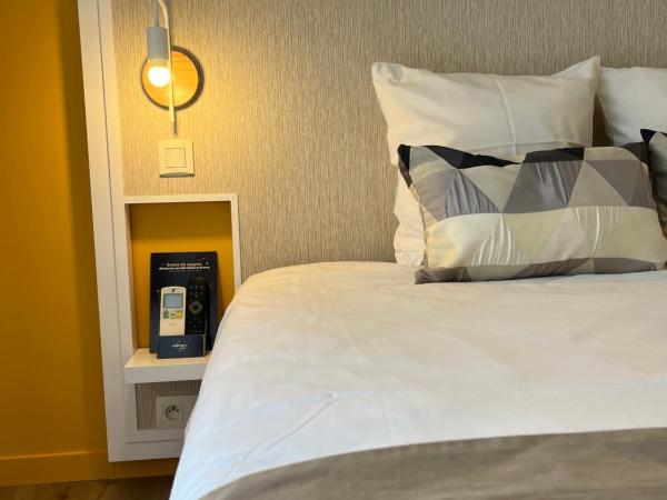 L'Espadon : photo 1 de la chambre chambre double confort avec balcon