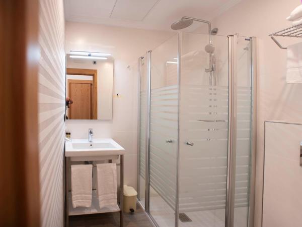 Pensión O Códice : photo 2 de la chambre chambre lits jumeaux supérieure