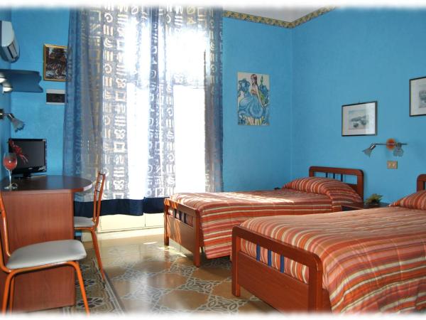 Bed and Breakfast D'Angelo : photo 7 de la chambre chambre double ou lits jumeaux avec salle de bains commune