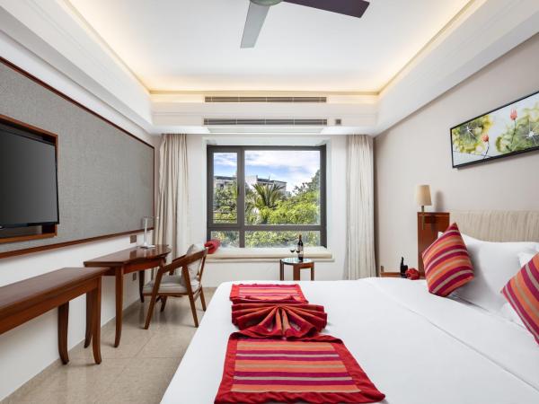 Sanya Seacube Holiday Hotel : photo 3 de la chambre chambre lit king-size ou lits jumeaux supérieure - vue sur jardin