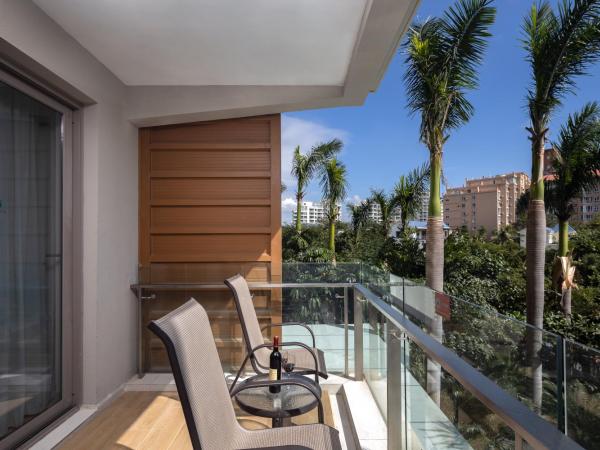 Sanya Seacube Holiday Hotel : photo 5 de la chambre chambre lit king-size ou lits jumeaux supérieure - vue sur jardin