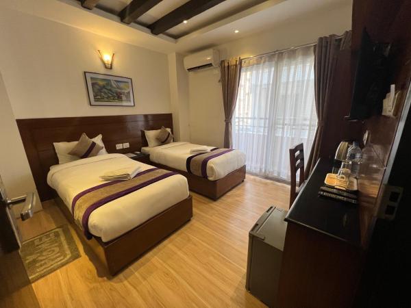 Hotel New Era : photo 1 de la chambre chambre lits jumeaux deluxe