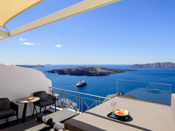 Villa Renos Hotel : photo 6 de la chambre chambre double ou lits jumeaux de luxe avec jacuzzi extérieur