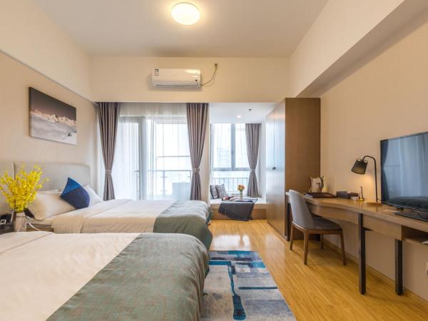 Livetour Hotel Shenzhou Road Metro Guangzhou : photo 6 de la chambre chambre lits jumeaux exécutive