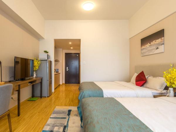 Livetour Hotel Shenzhou Road Metro Guangzhou : photo 5 de la chambre chambre lits jumeaux exécutive