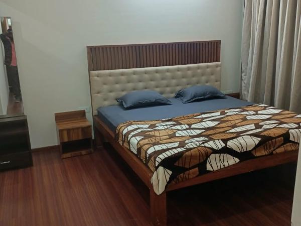 Royal Suites - 3 BHK - Neo : photo 10 de la chambre chambre lit king-size deluxe