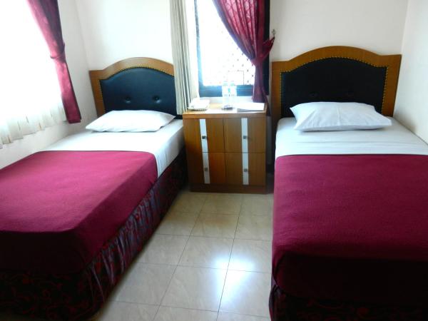 Karsa Utama Hotel : photo 6 de la chambre chambre double ou lits jumeaux supérieure