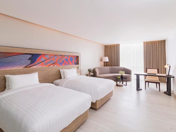 Novotel Phuket City Phokeethra : photo 1 de la chambre chambre lits jumeaux exécutive