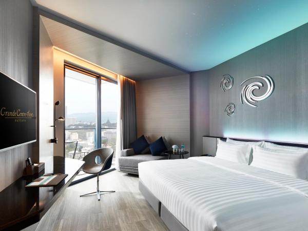 Grande Centre Point Pattaya : photo 2 de la chambre chambre double ou lits jumeaux deluxe - vue sur mer