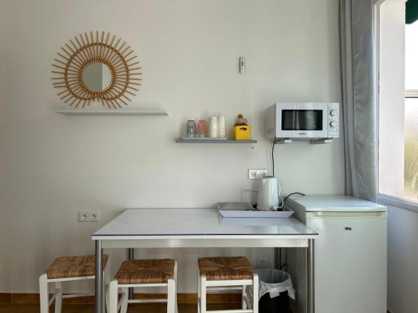 Hotel Punta e Mare des Chambres ou Appartements T2 : photo 7 de la chambre chambre quadruple avec terrasse