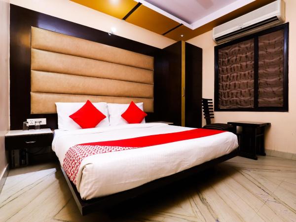 Super OYO Hotel J P Inn Near Patel Nagar Metro Station : photo 6 de la chambre chambre triple classique