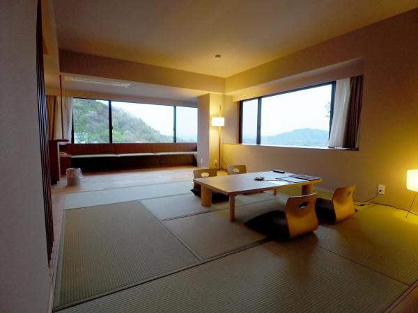Negiya Ryofukaku : photo 3 de la chambre chambre lits jumeaux d'angle deluxe avec coin tatami - vue sur montagnes - tour est - non-fumeurs