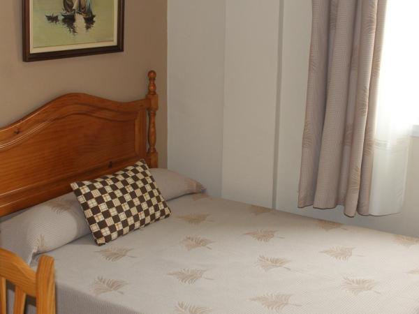 Maximiano Herculeo : photo 3 de la chambre chambre double ou lits jumeaux