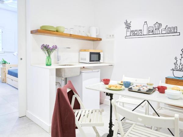 Eco Boutique Hostal Grau : photo 4 de la chambre studio familial avec kitchenette
