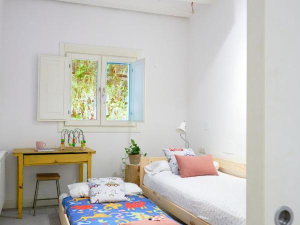 Eco Boutique Hostal Grau : photo 5 de la chambre studio familial avec kitchenette