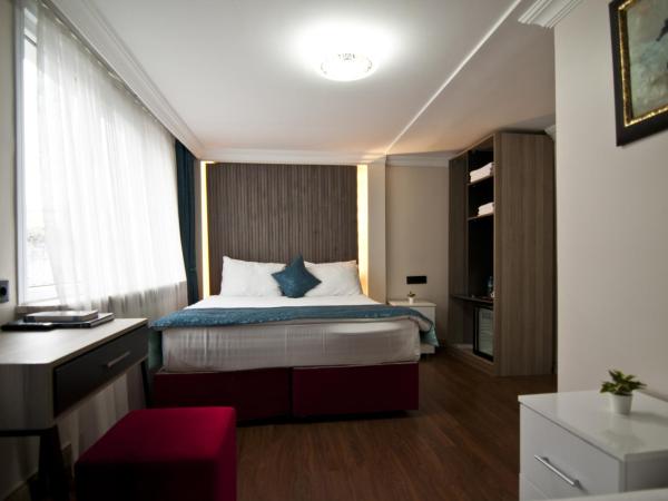 Genius Hotel Istanbul : photo 6 de la chambre chambre triple deluxe