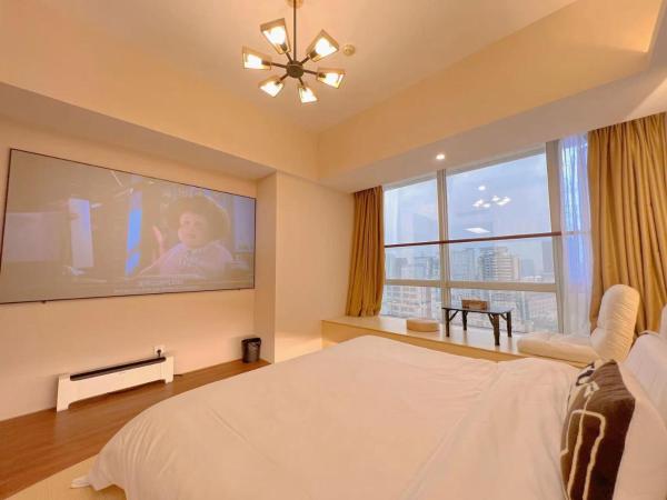 Youlejia Projection Apartment Guangzhou Beijing Road Pedestrian Street Branch : photo 7 de la chambre chambre lit king-size supérieure