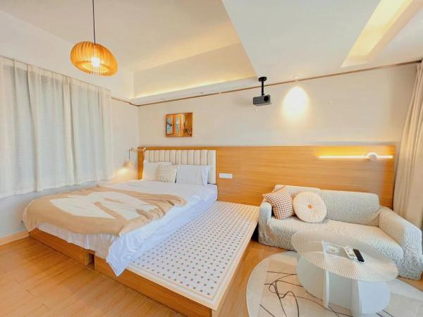 Youlejia Projection Apartment Guangzhou Beijing Road Pedestrian Street Branch : photo 4 de la chambre chambre lit king-size supérieure