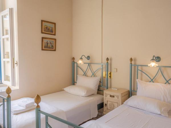 Suites Pandora : photo 7 de la chambre suite - vue sur jardin