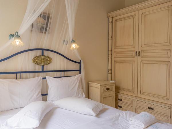 Suites Pandora : photo 9 de la chambre suite - vue sur jardin