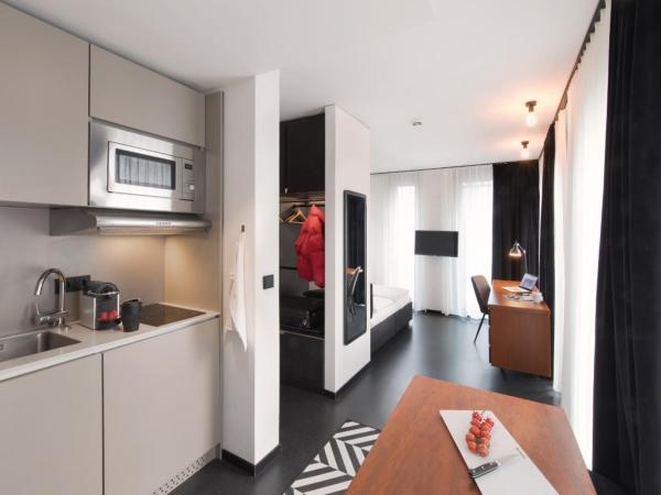 Brera Serviced Apartments Munich Schwabing : photo 4 de la chambre appartement confortable avec cuisine